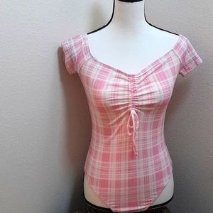 RUE 21 pink and black one piece body suit